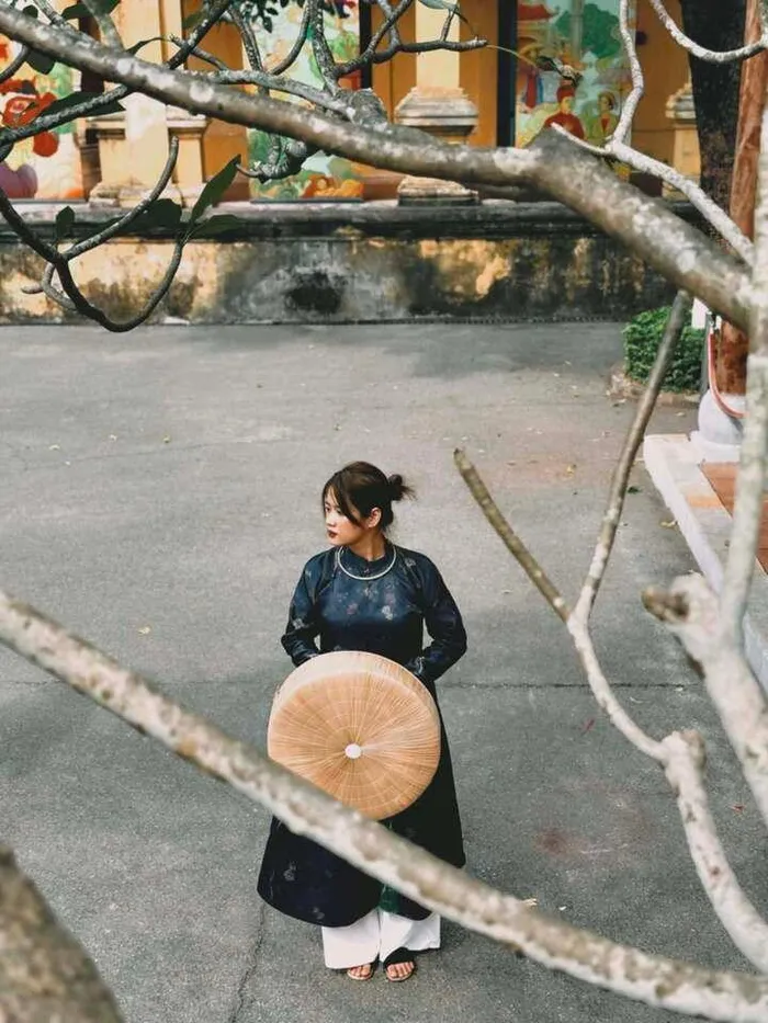 Xu hướng mặc cổ phục chụp ảnh Tết tại những địa điểm nổi tiếng ở Hà Nội năm 2025